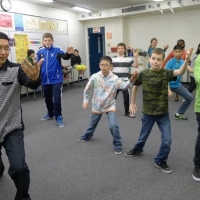 Teacher Robert Kong is Teaching Tai Chi at School